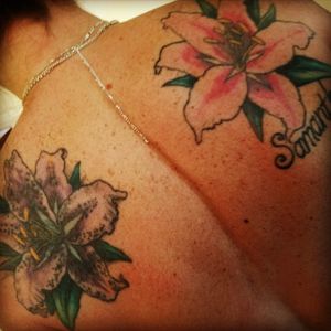 The purple lily is a cover up and the pink is dedicated to my daughter