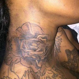 Neck tattoo rose