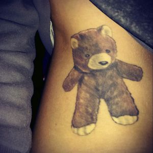 My first tattoo. Teddy bear behalf Pida, I got it for about one year.