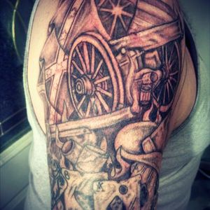 Civil war cannon, flags, and sabres. Tattoos by Sean SMFF