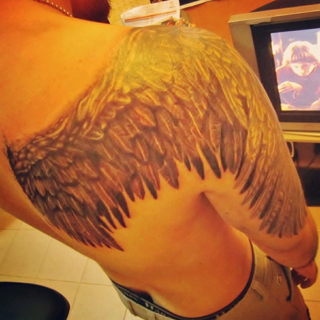 17 Awesome Angel Wing Tattoos