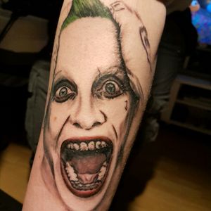 Started this freehand tattoo on my brother. Suicide squad. Jokern
