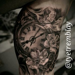 Some #flowers and #smoke to finish up this #clocktattoo #blackandgrey #realism