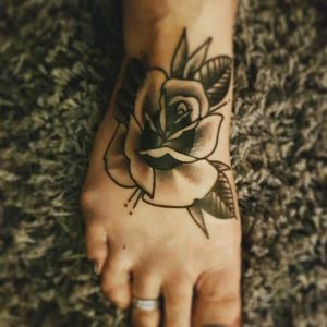 tradition rose on my foot , black and grey rocks !!