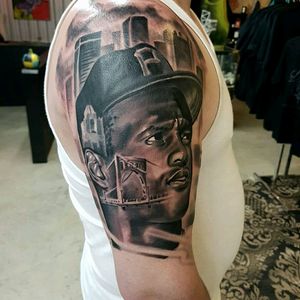 Half sleeve clemente tribute with Pittsburgh and the clemente bridge #blackandgreytattoos #blackandgrey  #portraittattoo #robertoclemente #pittsburghtattoo #realism #halfsleeve #tattoo #pittsburghpirates