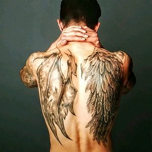 My most recent piece and definitely one of my favorites. My back tattoo. #halfangel #halfdemon #fallenangel #RisingDemon #tattoo #backtattoo #religous #blackandgrey #realism #tattoomodel #model #NYC #wings