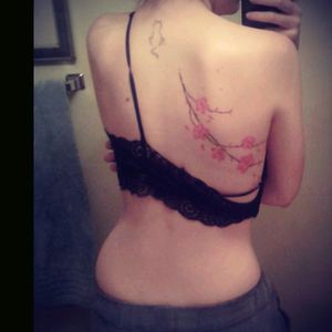 First was my cat on the back of my neck, age 16. Second was my cherry blossom cover-up, heart surgery scar, age 19.
