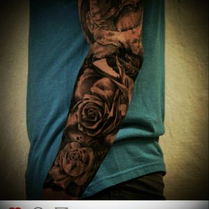 Front view of rose sleeve. #rose #sleeve #blackandgrey #blackwork #neworleanstattoomuseum