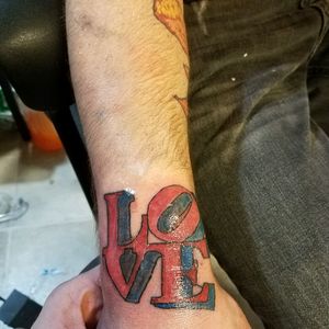 Cover up a messed up "love" with a bigger and better one.