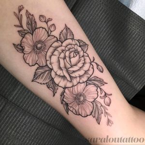 Inner bicep floral piece done by Sara at Incognito Tattoo in Los Angeles, CA.