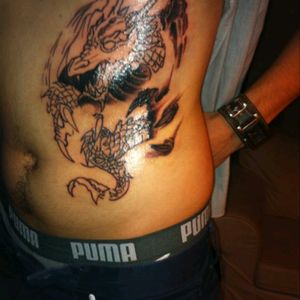 My first tattoo, at this point he was nearly done, only the head and the bottom part needed some shading left.