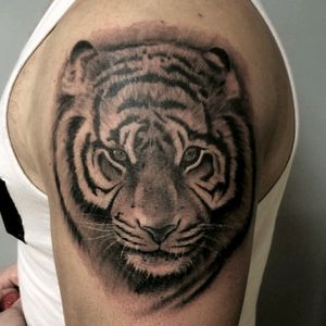 Tattoo by Queen Square tattoo club