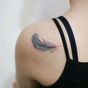 By #tattooistdoy #feather #feathertattoo