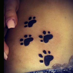 Dog paws tattoo