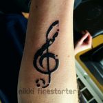Today I did my first official tattoo on my boyfriend! One small step toward kicking off my career as a tattoo artist. I have a handful of other people set up to practice on in the summer, but I'm always looking for more, so hit me up if you're interested! -- n!k #tattoo #apprentice #trebleclef #music #musicaltattoos