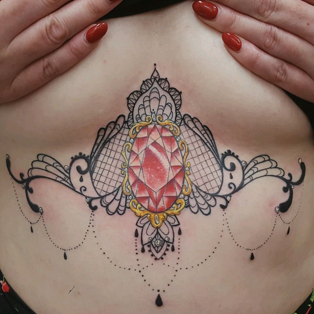 Tattooist on Tumblr: Healed underboobie from a while ago, pic is a little  distorted cus she's holding her bra out the way, thanks #traditional