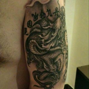 Upper left arm sleeve, asian style dragon and tiger