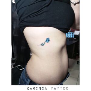 Minimal Blue Rose Instagram: @karincatattoo #rosetattoo #minimal #tattoo #smalltattoo #minimaltattoo #little #tatted #tattooart #tattooartist #tattooer #bluetattoo #colorfultattoo #girltattoo
