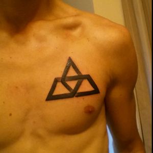 First tattoo, geometric trinity symbol
