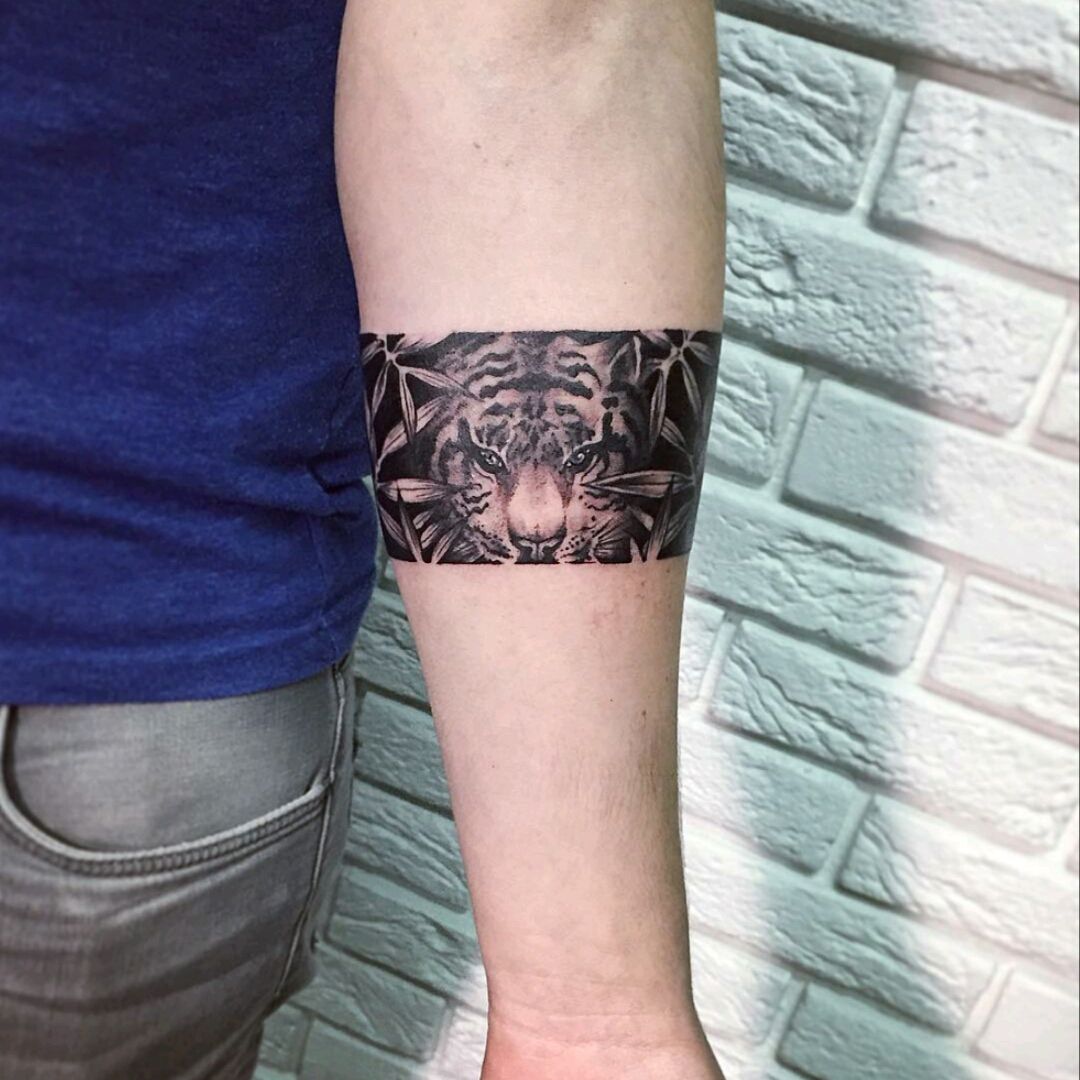 Tattoo creates first impression of personality tiger arm forearm tattoo  black blackart tigereye roar blackandgrey blackink  Instagram post  from Black Poison Tattoos blackpoisontattoos