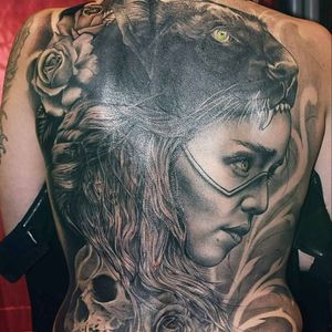 Tribal cover up backpiece .won 1st price best back in antwerp tattooconvention #trashcore #blackandgrey #backpiece #realism #panther #face #roses #skull