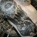 Im speechless guys... incredible tattoo by Denis Torikashvili #anjo #angel #pretoecinza #blackandgrey #relogio #clock #realismo #realism #DenisTorikashvili