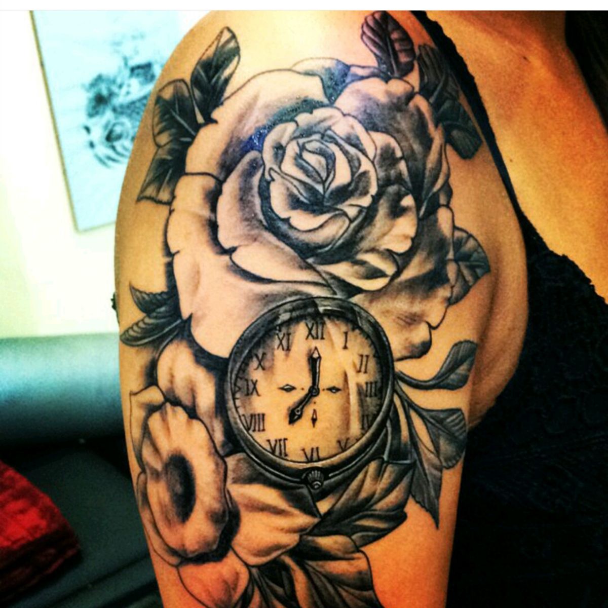 Tattoo uploaded by Amanda Birkeland Eide • Roses and a clock, the time ...