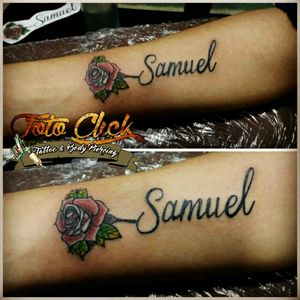 Nontraditional rose whit name tattoo