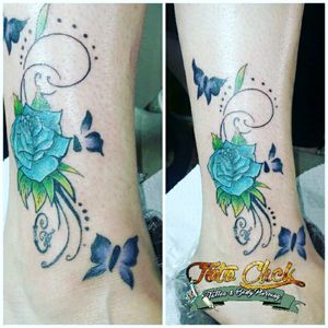 Blue rose whit butterflies tattoo