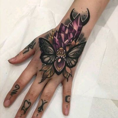 Attractive Butterfly tattoo on hand for girl