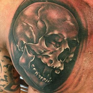 Skull started on chest Made with Starr Tattoo Supplies, Shadowline, World Famous, Critical and Butterluxe Thanks for looking #skulltattoo #blackandgrey #realistictattoo #chesttattoo #tattoo #tattooartist #tattoostudio #tattooart #bodyart