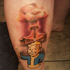 Fallout tattoo done by Kelly Harris at Scarecrow Art Gallery in Wylie, TX#Fallout #game #videogame #apocalypse #explosion #vaultboy