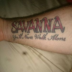 My first tattoo I had done in 2014 savanna is my daughters name the font style is the same as the Japanese car Mazda rx3 savanna as I'm a massive rotary lover you'll never walk alone is a message to her that means no matter what happens in life she will never walk alone aswell as I'm a huge Liverpool Fc fan