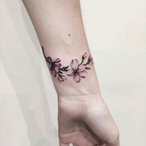 By #serge_tattooer #cherryblossom #wristtattoo #flower #floral