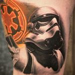 Backlit storm trooper with murky imperial symbol
