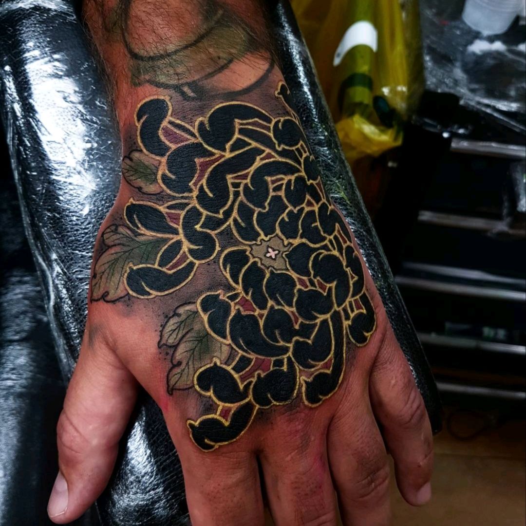 Black Koi and Chrysanthemum Japanese tattoo by George Bardadim