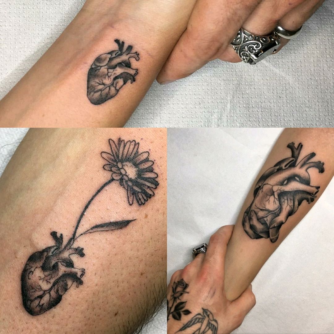 holding hands heart tattoo