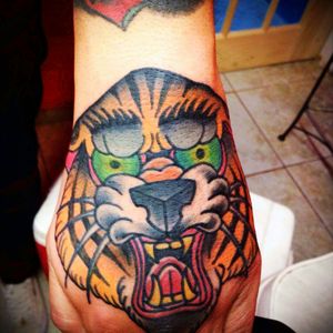 Tiger fist made by Daniel SainesMexican tattoo artist#tigertattoo #tigerfist#eyeoftiger #traditional #freehand