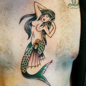 Traditional mermaid on a chest.