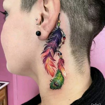 colorful indian feather tattoo