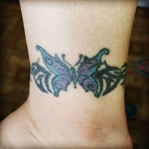 Butterfly and tribal. I love butterflies and tbh, not really sure about the tribal.