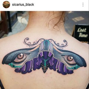 Third tattoo. #moth #mothtattoo #losttime #backpiecetattoo #eyes #colour #neotraditional