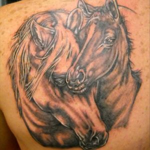 A mother will always guard her young. #horsetattoo