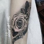 My client didn't like her tribal wrist piece so instead of covering it we opted for some pretty roses to distract the eye
