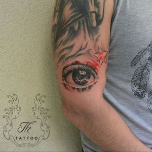 Realistic eye tattoo by Theodor