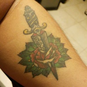Rose with a dagger through. Nice and simple.