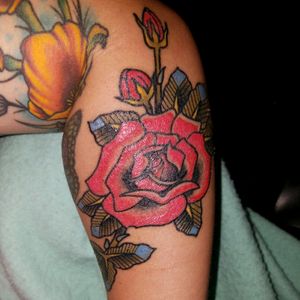 Red rose done on lower forearm done at the Virginia beach tattoo festival 2017.