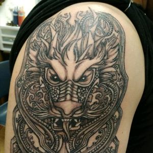Dragon tattoo, by Leslie Dwain Spohn