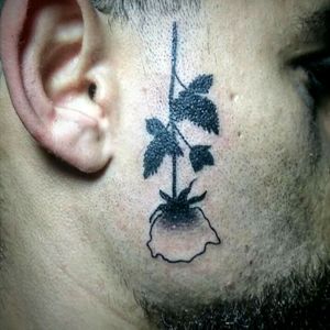 Tattoo faceBlack rose
