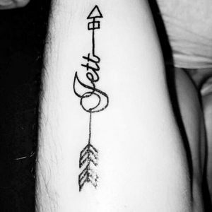 My nickname which means a lot and an arrow which means bravery and protection. Pointing forward to show to keep moving forward.